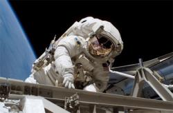 Heidemarie Stefanyshyn-Piper performing an EVA during STS-115. Image credit: NASA