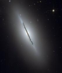 Galaxy NGC 5866, seen edge on. Image credit: Hubble
