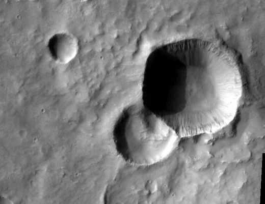 Craters On Mars. This double crater appears to