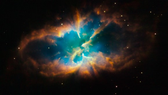 Planetary nebula NGC 2818 is nested inside the open star cluster NGC 2818A. Credit: NASA, ESA, and the Hubble Heritage Team (STScI/AURA)  