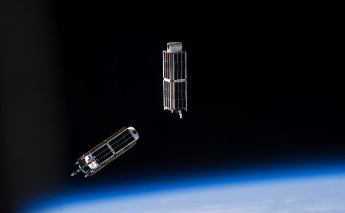 NanoRacks CubeSats photographed after deployment from the ISS by an Expedition 38 crew member. Credit: NASA