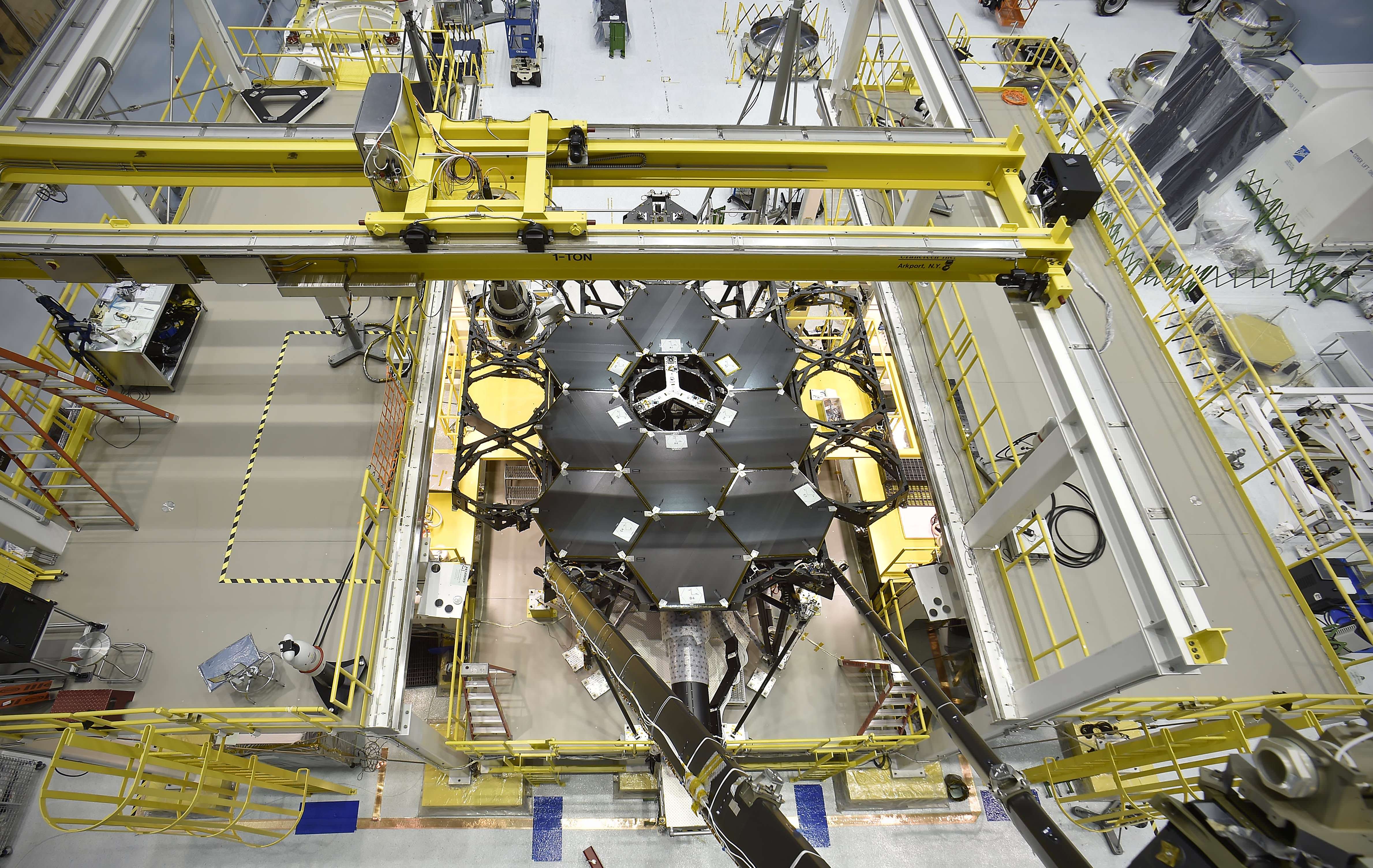 This rare overhead shot of the James Webb Space Telescope shows the nine primary flight mirrors installed on the telescope structure in a clean room at NASA's Goddard Space Flight Center in Greenbelt, Maryland. Credits: NASA's Goddard Space Flight Center/Chris Gunn