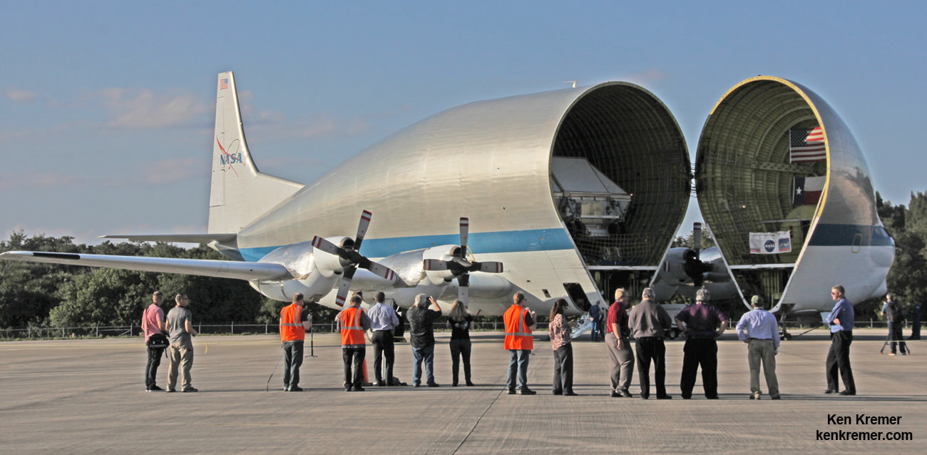 NASA's Orion EM-1 crew module pressure vessel arrived at the Kennedy Space Center's Shuttle Landing Facility tucked inside NASA's Super Guppy aircraft on Feb 1, 2016. The Super Guppy opens its hinged nose to unload cargo.  Credit: Ken Kremer/kenkremer.com