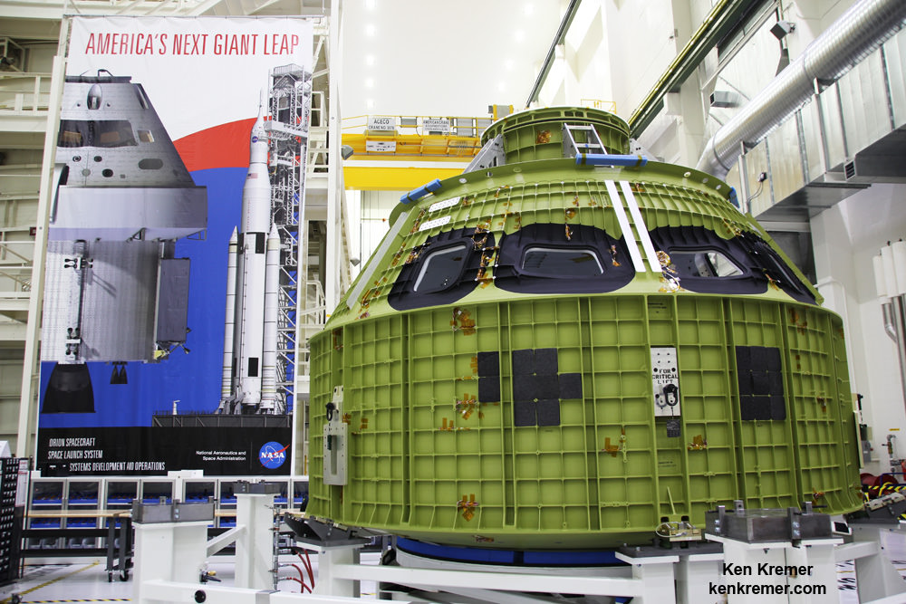 Orion crew module pressure vessel for NASA's Exploration Mission-1 (EM-1) is unveiled for the first time on Feb. 3, 2016 after arrival at the agency's Kennedy Space Center (KSC) in Florida. It is secured for processing in a test stand called the birdcage in the high bay inside the Neil Armstrong Operations and Checkout (O&C) Building at KSC. Launch to the Moon is slated in 2018 atop the SLS rocket.  Credit: Ken Kremer/kenkremer.com
