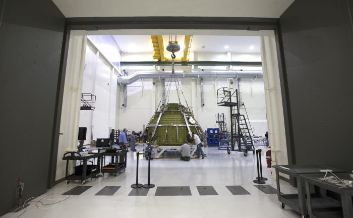 Lockheed Martin engineers and technicians prepare the Orion pressure vessel for a series of tests inside the proof pressure cell in the Neil Armstrong Operations and Checkout Building at NASA's Kennedy Space Center in Florida. Photo credit: NASA/Kim Shiflett