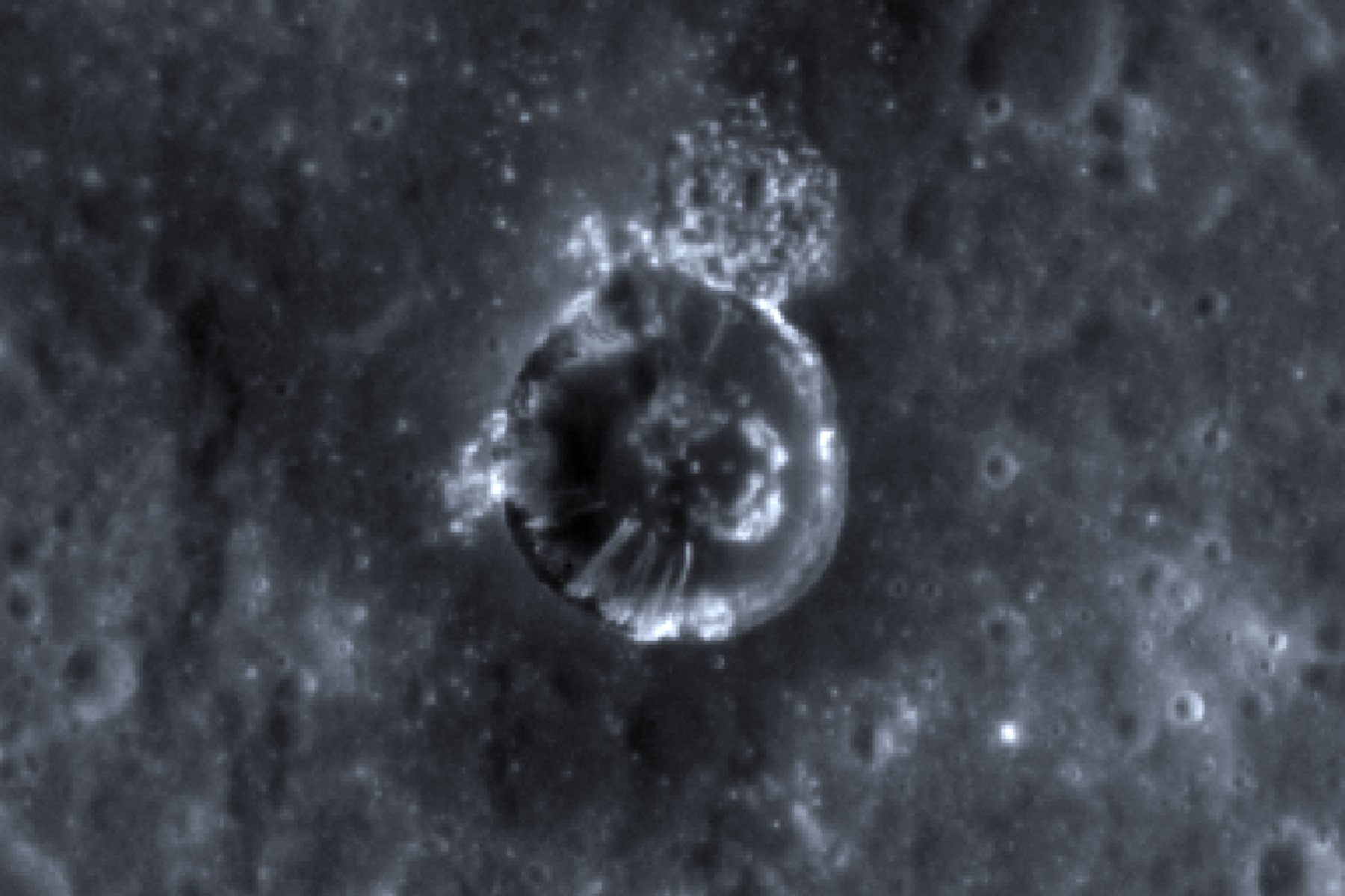 Image of the streaks or 'lineae' on the slopes of the crater wall on Mercury captured by Messenger (Credit : NASA/JHU/APL)
