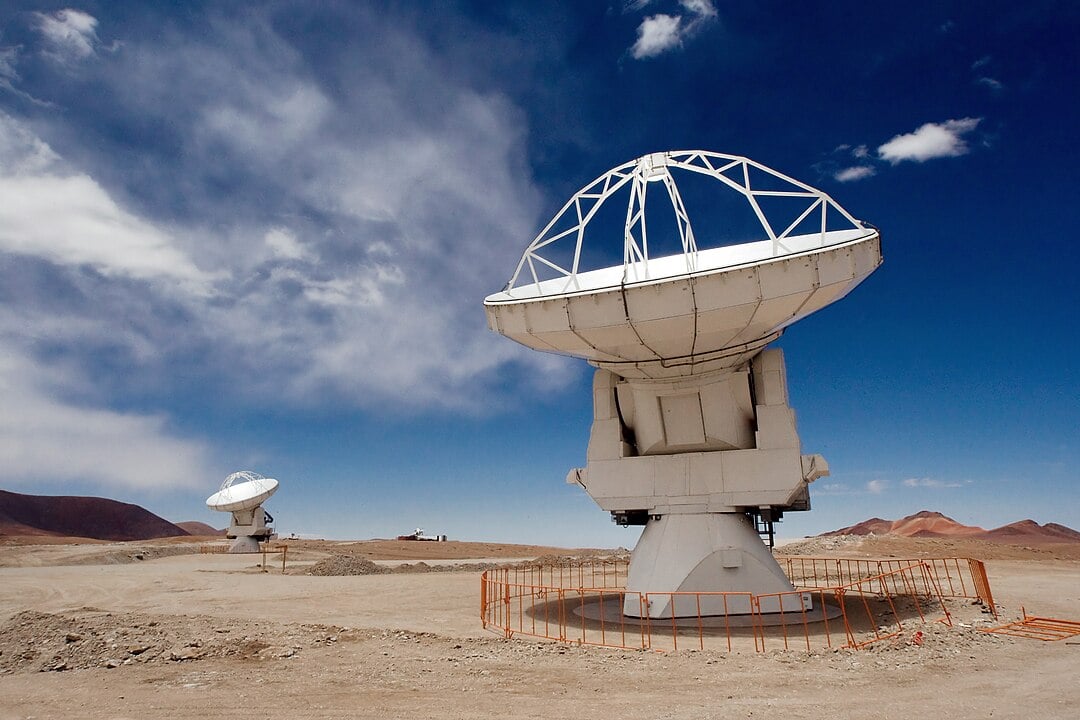 Two of the Atacama Large Millimetre/submillimetre Array (ALMA) 12-metre antennas (Credit : Iztok Bončina/ESO)