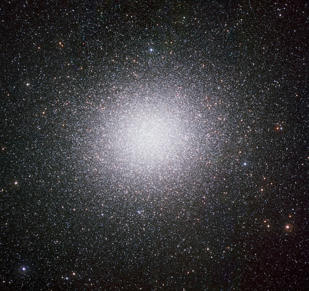 Omega Centauri is the largest globular cluster in the Milky Way. Astronomers think it might host an elusive intermediate-mass black hole, and new research tests that possibility. It used the JWST to probe the candidate IMBH's accretion rate. Image Credit: By ESO - https://www.eso.org/public/images/eso0844a/, CC BY 4.0, https://commons.wikimedia.org/w/index.php?curid=6283919