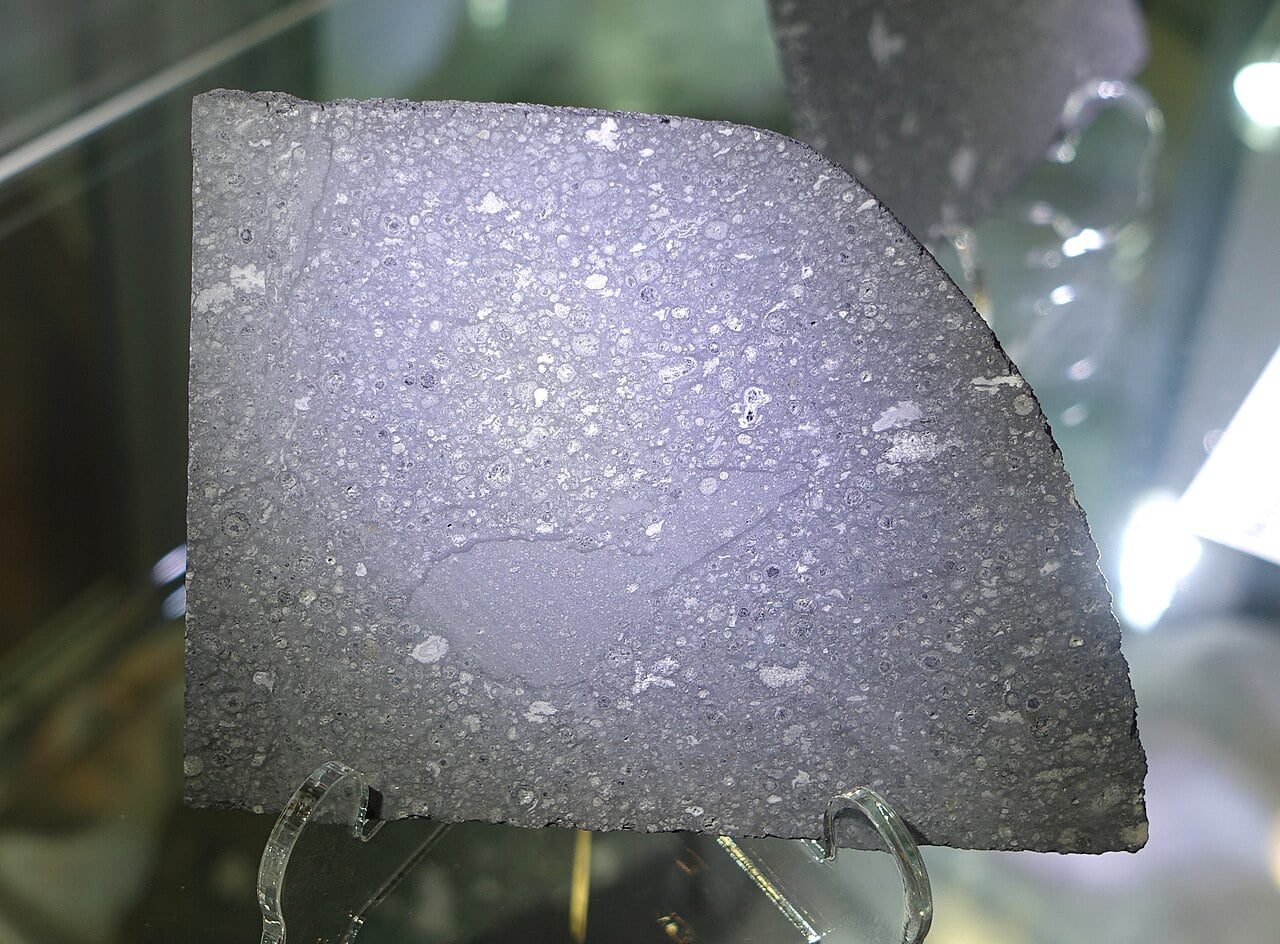 A specimen of the Allende meteorite at the Center for Meteorite Studies, Arizona State University. More than two tons fell across Chihuahua in 1969, and fragments are still yielding new results more than half a century later.