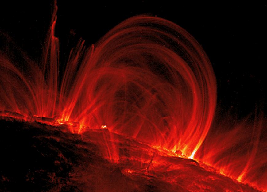 Coronal loops, observed in the ultraviolet radiation Fe IX 17.1 nm (171 Å) by the TRACE spacecraft on 6 November 1999, extending 120 000 km off the Sun's surface. (Credit: TRACE/NASA).