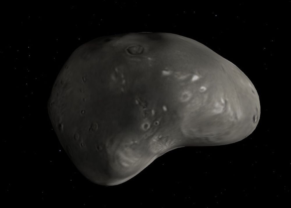 This illustration shows Mars' moon Deimos and its distinctive south pole depression. Thought the moon's surface appears smoother than its sibling Phobos, it's still been battered by impacts. One major impact created the south pole crater, and also spread a layer of regolith on the moon's surface. Image Credit: NASA Eyes on the Solar System.