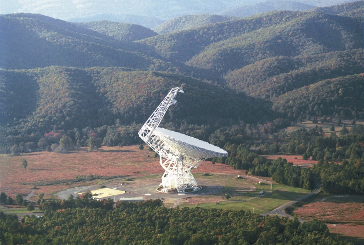 The Robert C. Byrd Green Bank Radio Telescope has a collecting area of 2.3 acres which focuses the radio waves falling on it onto sensitive receivers at the top of the boom attached to the side (Credit : NRAO/AUI)