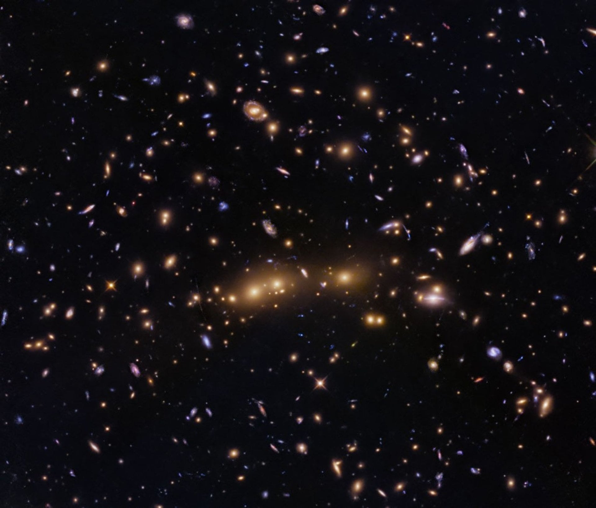 Hubble Captures Two Galaxy Clusters Merging
