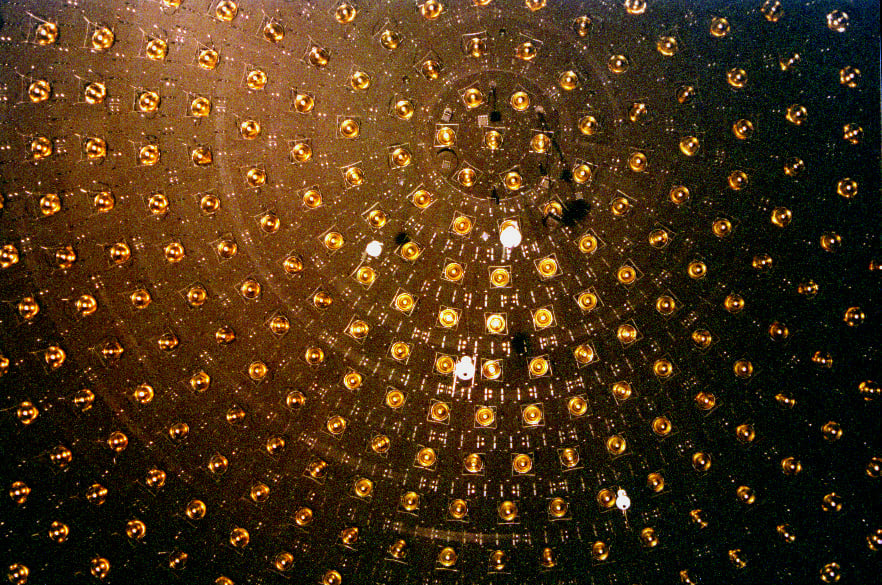 The MiniBooNE detector at Fermilab, a different experiment to Super-Kamiokande but built on the same principle, a tank lined with photomultiplier tubes, watching for the faint flash of light a neutrino leaves behind as it passes through (Credit : Fred Ulrich)
