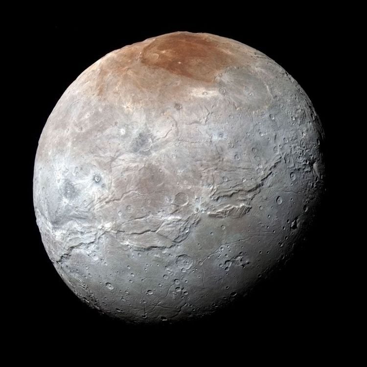 Charon’s Mountains Reveal Moon Once Spun 10x Faster