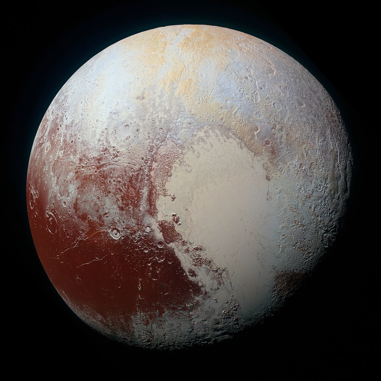 Pluto as seen by New Horizons during its 2015 flyby. Sputnik Planitia is a heart-shaped region that appears to be resurfaced by upwelling liquid nitrogen from below. That action creates what look like convection cells outlined by darker lines that could be flow channels. Credit: NASA/JHU/APL/New Horizons mission