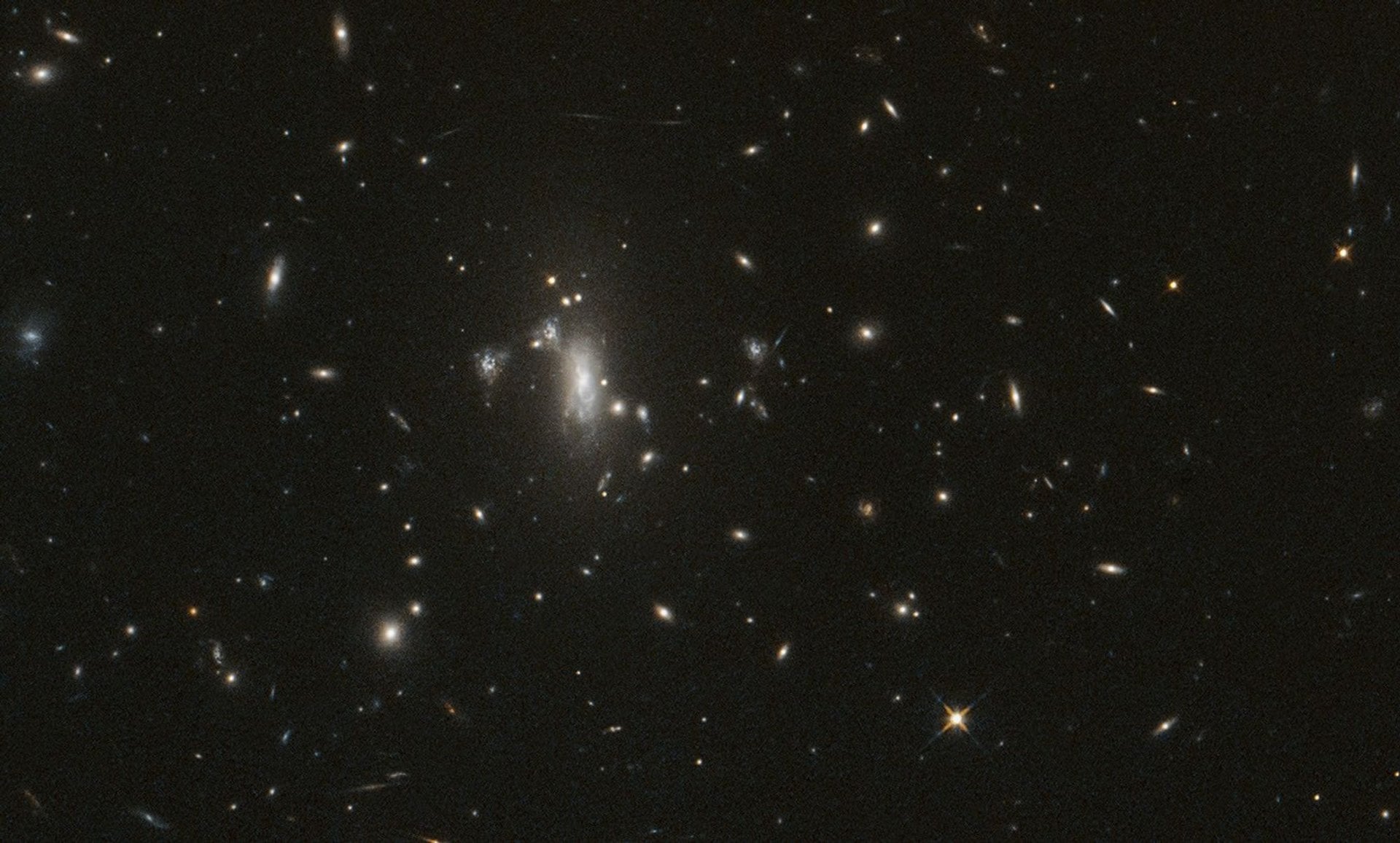 NASA's Hubble Marks its 200,000th Orbit by Watching Lensed Supernova
