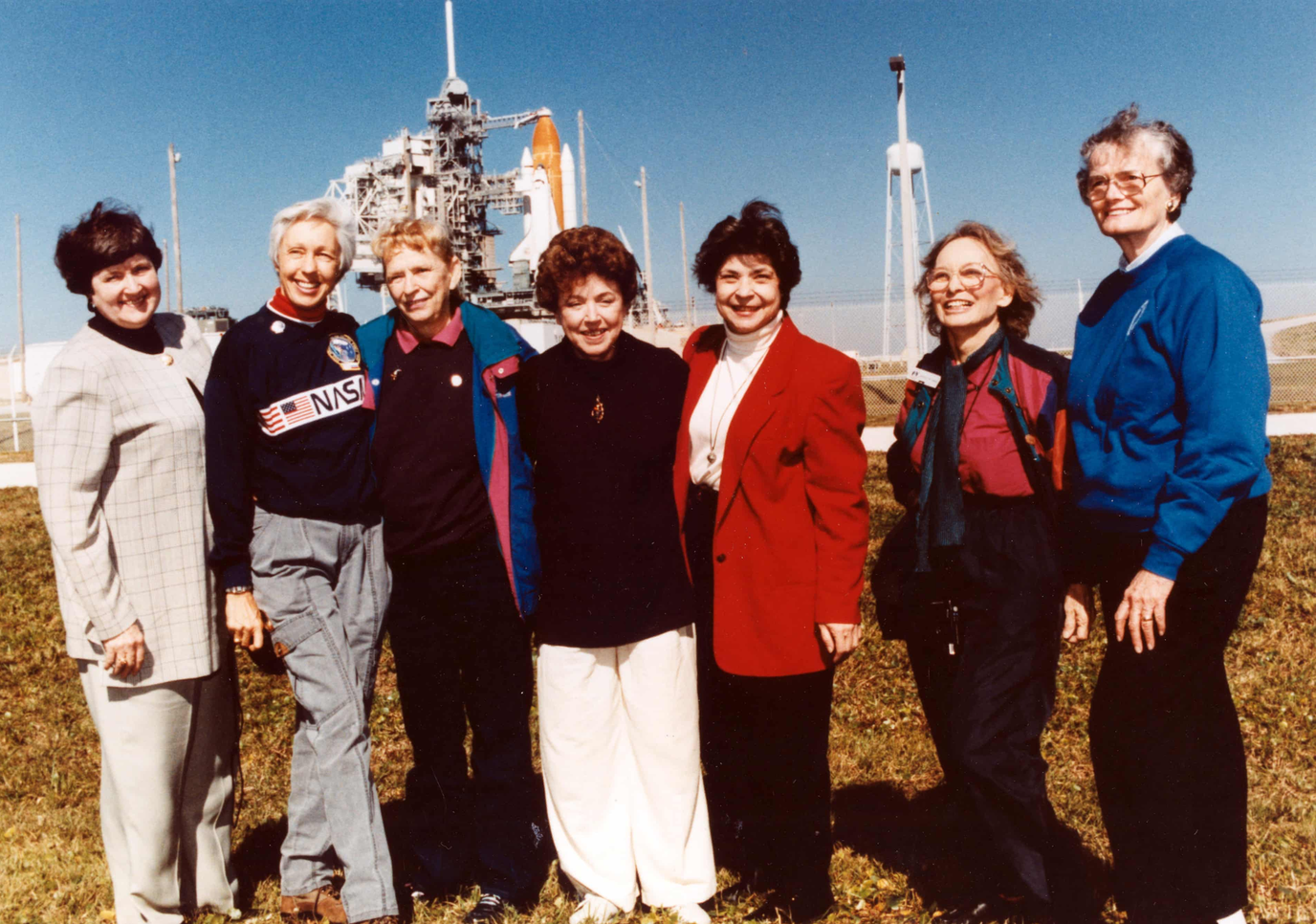 The seven surviving women who participated in the Mercury 13 program, including Wally Funk (second from left), attending the launch of the Space Shuttle Discovery in 1995. Credit: NASA