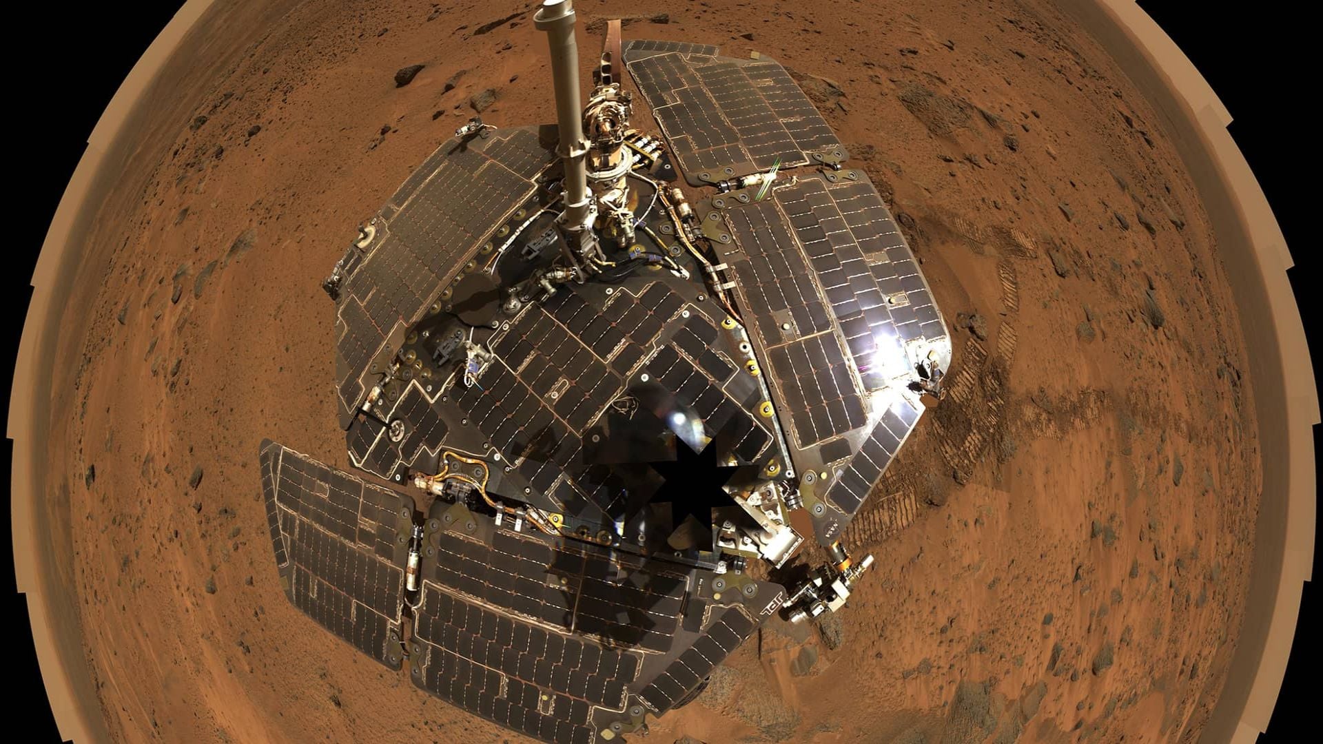 A panorama of the region where the Spirit rover landed inside Mars's Gusev Crater. Dust and soil at the site show traces of water-related minerals altered magnetite and hematite. Credit: NASA/JPL-Caltech/Cornell