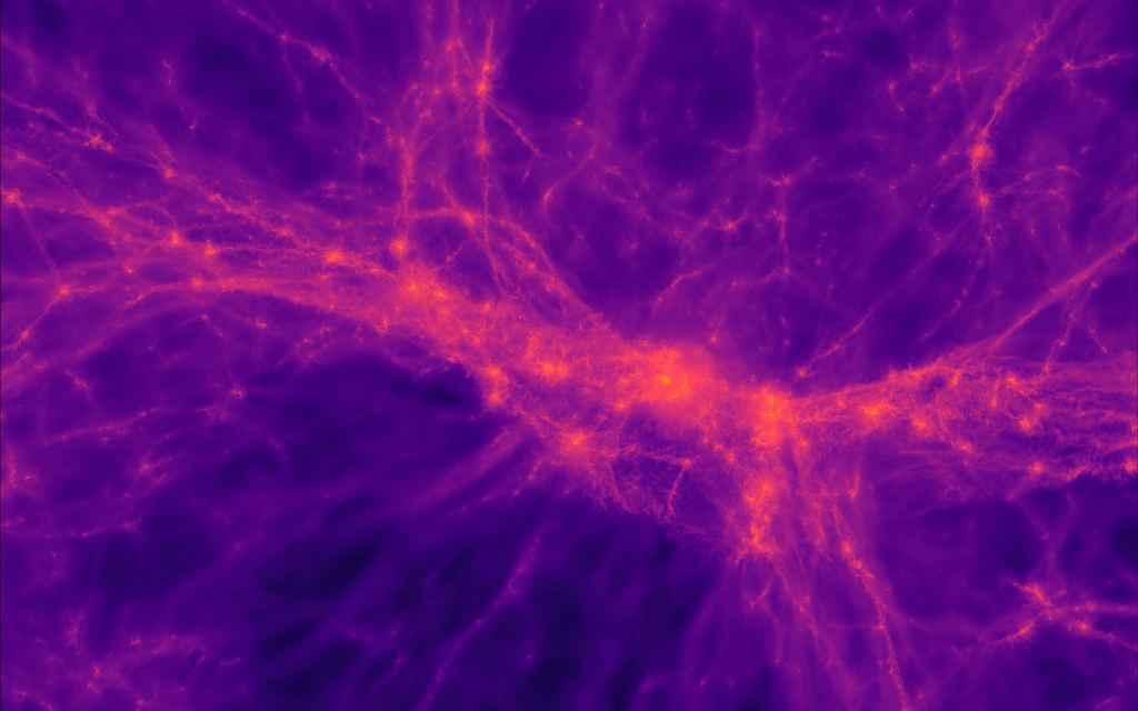 This image from TNG 50 shows the large-scale structure of cosmic gas in the early Universe at redshift three. It shows a region of space 15 megaparsecs across, where the cosmic web of gas filaments come together to fuel galactic formation and growth. Image Credit: Illustris TNG 50.