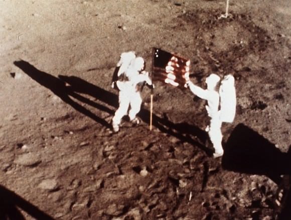Neil Armstrong and Buzz Aldrin plant the US flag on the Lunar Surface during 1st human moonwalk in history 45 years ago on July 20, 1969 during Apollo 1l mission. Credit: NASA