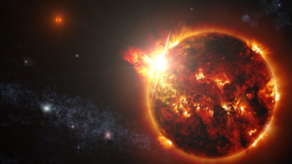 This artist's illustration shows a red dwarf emitting a powerful flare. Red dwarfs are known for their flaring activity, which can make their binary white dwarf partners very difficult to detect. Image Credit: NASA