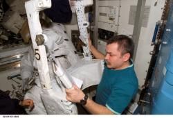 Cosmonaut Mikhail Tyurin helps with the EVA. Image credit: NASA