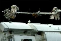 Spacewalkers outside the station. Image credit: NASA TV