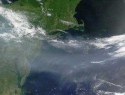 Particulates from pollution mixing with clouds above the US (NASA)