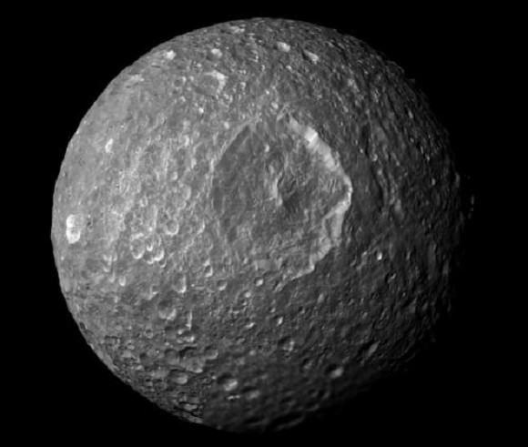 This mosaic, created from images taken by NASA's Cassini spacecraft during its closest flyby of Saturn's moon Mimas, looks straight at the moon's huge Herschel Crater Credit: NASA/JPL