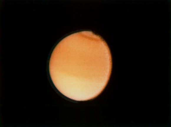  Voyager 2 photograph of Titan, taken Aug. 23, 1981 from a range of 2.3 million kilometers (1.4 million miles), shows some detail in the cloud systems on this Saturnian moon. Credit: NASA/JPL