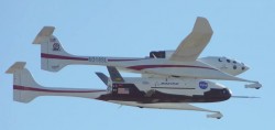 The X-37A carried by WhiteKnightOne in 2005 (Alan Radecki)