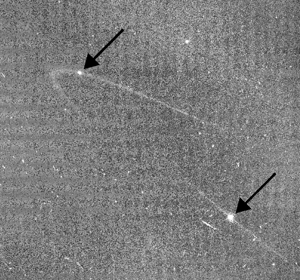 Arrows indicate the positions of Anthe, at top left, and Methone, at bottom right.  Credit:  NASA/JPL