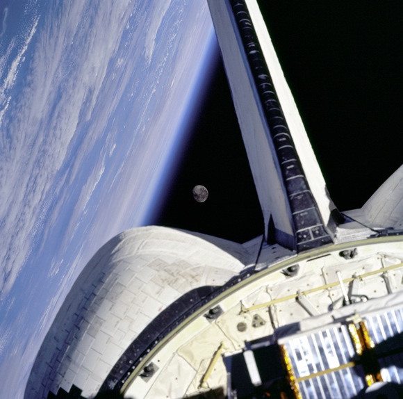 The Earth and Moon, seen from the shuttle Discovery. Image credit: NASA