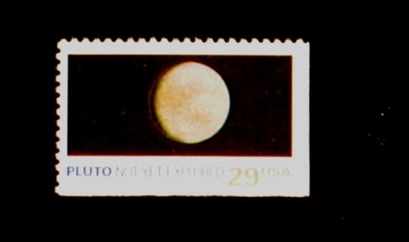 Pluto US postal stamp from 1991.  Credit:  JHU/APL