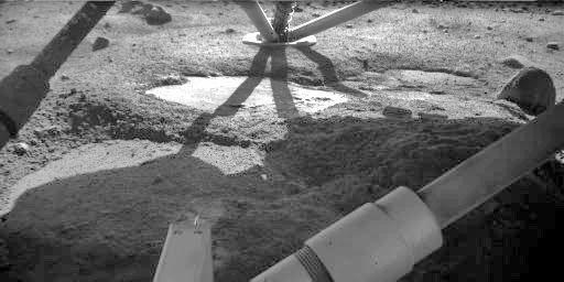 Holy Cow under the Phoenix lander.  Credit: NASA/JPL/Caltech/U of AZ