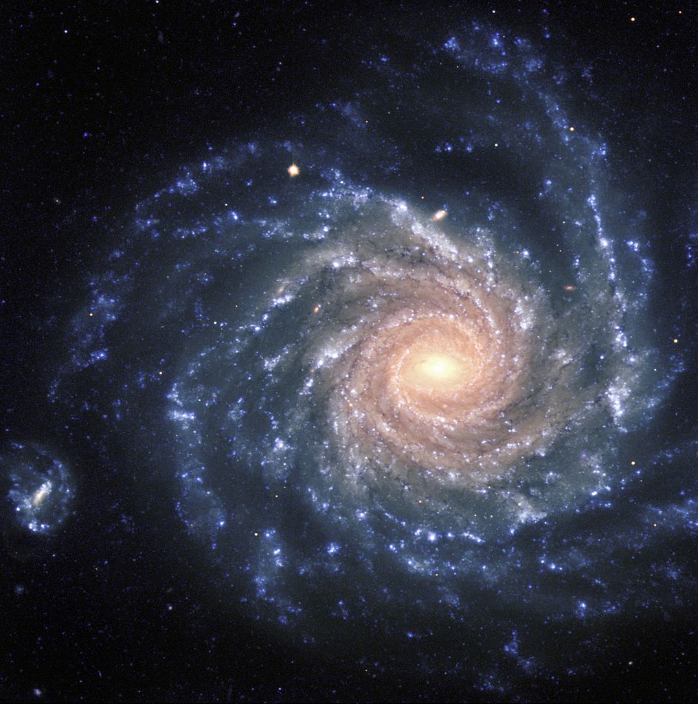 The large spiral galaxy NGC 1232 shows reddish stars in the central regions, while while the spiral arms are populated by young, blue stars and many star-forming regions. Our galaxy's spiral arms are rich in star-formation regions like these. Image: ESO