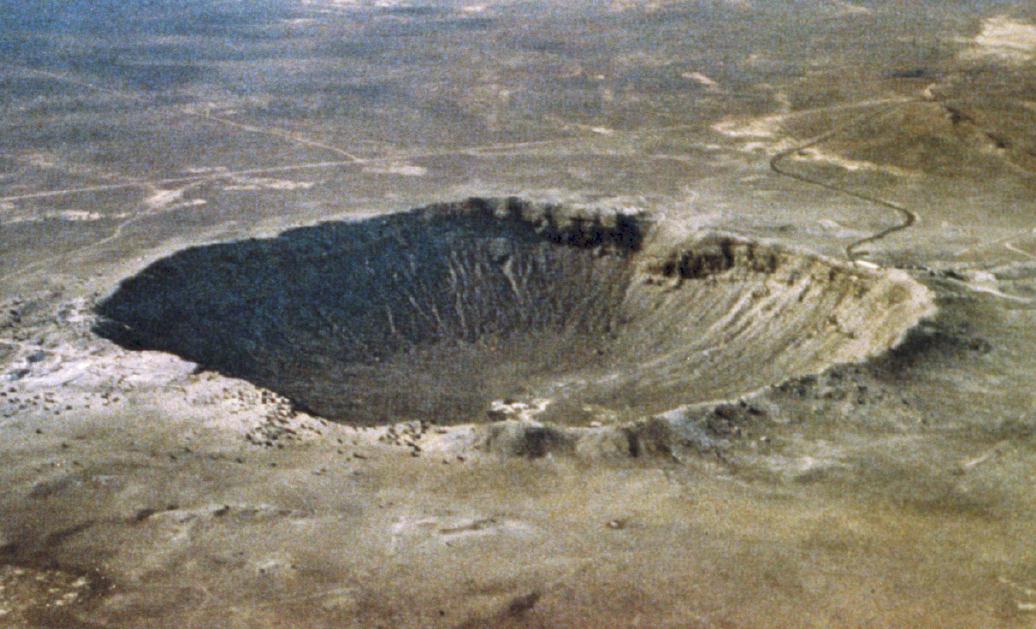 Barringer Meteor Crater in Arizona. Scientists studied the forces in the event that created this impact scar. Image credit: NASA