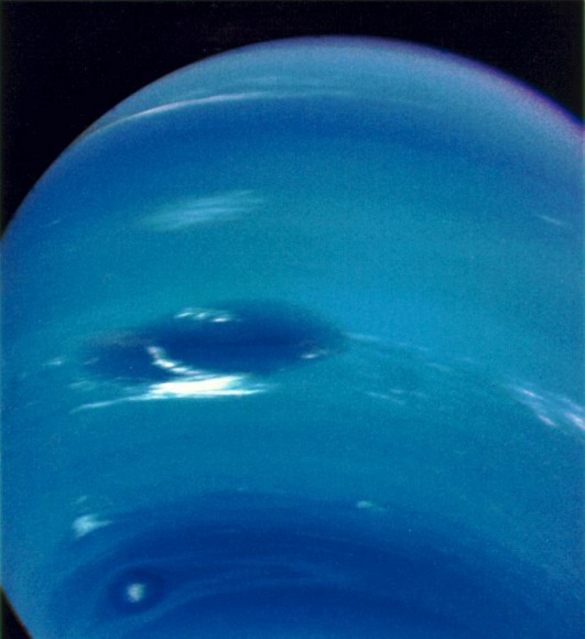 Neptune and its Great Dark Spot. Image credit: NASA/JPL