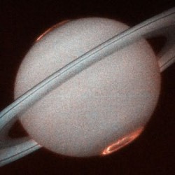 Saturn's aurora in Ultraviolet from Hubble.Credits: J.T. Trauger (Jet Propulsion Laboratory) and NASA.  