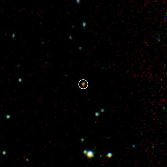 The Peters Automated Infrared Imaging Telescope (PAIRITEL) in Arizona caught GRB 080607’s afterglow (circled) about three minutes after the explosion. The afterglow’s light has been greatly dimmed and reddened by interstellar dust in its host galaxy, 11.5 billion light years away. Credit: Adam Miller and Daniel Perley/UC Berkeley