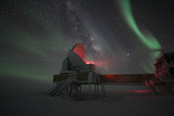 The South Pole Telescope under the aurora australis (southern lights). Photo by Keith Vanderlinde