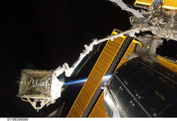 The ISS's CanadArm 2 carries the S6 truss segment. Credit: NASA