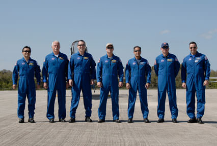 The crew members for the STS-119 mission pose for a photo after arriving at NASA's Kennedy Space Center in Florida to prepare for launch. Photo credit: NASA/Kim Shiflett 