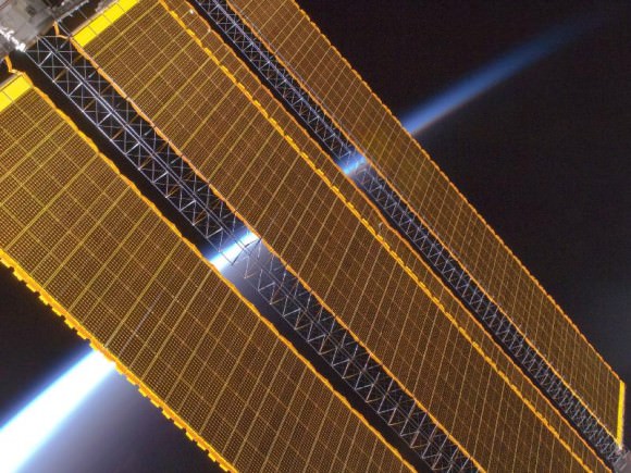 Our Earth's horizon and the International Space Station's solar array panels are featured in this image photographed by the Expedition 17 crew in August 2008.  Credit: NASA