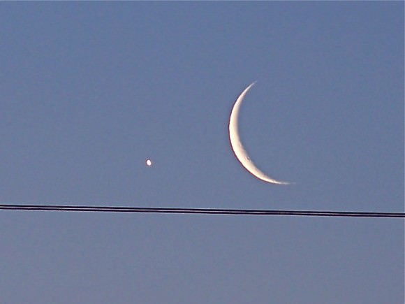 The Moon and Venus (and power lines). Credit:  Bob Bowhay