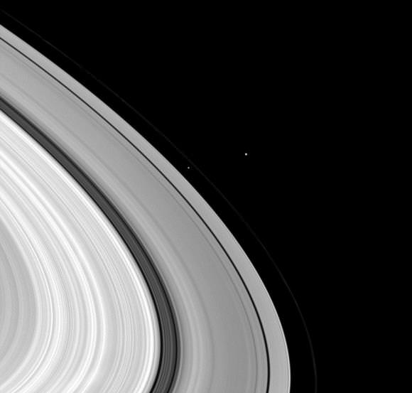 Three of Saturn's moons bunch together in this image by Cassini.  Credit: NASA/JPL/Space Science Institute.  Click for larger image.