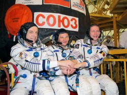 Bob Thirsk of the Canadian Space Agency, Russian Cosmonaut Roman Romanenko and Flight Engineer Frank De Winne of the European Space Agency. Credit: NASA