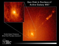 A WFPC2 image of a spiral-shaped disk of hot gas in the core of active galaxy M87. HST measurements show the disk is rotating so rapidly it contains a massive black hole at its hub.