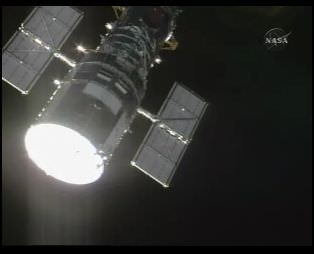 Screenshot of first view of Hubble from Atlantis on NASA TV. 
